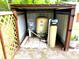 Water filtration and treatment system, housed in an open sided enclosure at 20386 Sw 95Th St, Dunnellon, FL 34431