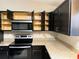 Well-equipped kitchen featuring stainless steel appliances, modern cabinetry, and ample countertop space at 20386 Sw 95Th St, Dunnellon, FL 34431