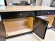 Open kitchen island featuring dark cabinets and drawers with easy access to shelving at 20386 Sw 95Th St, Dunnellon, FL 34431