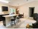 Bright open living area seamlessly connects the kitchen and dining spaces, creating a warm gathering spot at 20386 Sw 95Th St, Dunnellon, FL 34431