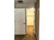 Walk-in closet with ample shelving and neutral carpeting at 20386 Sw 95Th St, Dunnellon, FL 34431