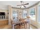 Cozy breakfast nook with a table, lots of natural light, and a peaceful view of the outdoor space at 20921 Sw 36Th St, Dunnellon, FL 34431