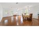 Bright and airy living room with hardwood floors and large windows, perfect for entertaining at 20921 Sw 36Th St, Dunnellon, FL 34431