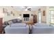 Comfortable living room with plush seating, large TV, and neutral decor for a relaxed and inviting atmosphere at 20921 Sw 36Th St, Dunnellon, FL 34431