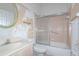 Bathroom featuring a shower/tub combo and sink at 347 Oak Lane Dr, Ocala, FL 34472