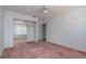 Bedroom featuring closet with mirror doors and ceiling fan at 347 Oak Lane Dr, Ocala, FL 34472