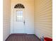 Close-up of the home's front door and entryway, highlighting the architectural details and welcoming ambiance at 347 Oak Lane Dr, Ocala, FL 34472