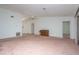 Large open living room with ceiling fan and view to connected rooms at 347 Oak Lane Dr, Ocala, FL 34472