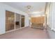 Sunroom featuring sliding glass doors and ceiling fan at 347 Oak Lane Dr, Ocala, FL 34472