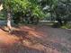 Large backyard with mature trees and natural setting, perfect for outdoor activities and enjoying nature at 3579 Sw Shorewood Dr, Dunnellon, FL 34431