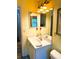 Bathroom featuring a vanity and a lighted mirror at 3579 Sw Shorewood Dr, Dunnellon, FL 34431
