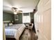 Serene bedroom with white walls, a ceiling fan, closet and a view to the exterior, a peaceful retreat at 3579 Sw Shorewood Dr, Dunnellon, FL 34431