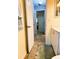 Neutral hallway offers views of a bedroom and bathroom, enhancing the home's open and airy feel at 3579 Sw Shorewood Dr, Dunnellon, FL 34431