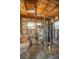 Interior of an outbuilding showing well and water conditioning system in good working order at 3579 Sw Shorewood Dr, Dunnellon, FL 34431