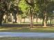 A wooded area beyond the street offers a natural and serene environment at 3579 Sw Shorewood Dr, Dunnellon, FL 34431