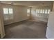 Spacious carpeted bedroom with plantation shutters providing plenty of natural light at 3918 Sw 57Th Ave, Ocala, FL 34474
