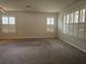 Spacious carpeted bedroom with plantation shutters providing plenty of natural light at 3918 Sw 57Th Ave, Ocala, FL 34474
