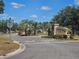 Community entrance sign for Saddlecreek 2 neighborhood with manicured landscaping at 3918 Sw 57Th Ave, Ocala, FL 34474
