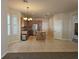 Bright kitchen with an island, stainless steel appliances, and an adjacent dining area at 3918 Sw 57Th Ave, Ocala, FL 34474
