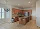 Updated kitchen featuring stainless steel appliances, a center island, and ample cabinet space at 3918 Sw 57Th Ave, Ocala, FL 34474