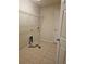 Functional laundry room with tile floors, washer/dryer hookups, and practical shelving for storage at 3918 Sw 57Th Ave, Ocala, FL 34474