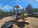 Playground with a spiral slide and climbing structure, surrounded by mulch at 3918 Sw 57Th Ave, Ocala, FL 34474