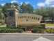 Saddlecreek 2 community sign surrounded by stone accents and lush landscaping at 3918 Sw 57Th Ave, Ocala, FL 34474