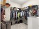 Walk-in closet with organized storage and plenty of hanging space at 4411 Nw 53Rd Ct, Ocala, FL 34482
