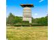 Welcome to Ocala Preserve: The entrance showcases a beautiful tower and manicured landscaping in this vibrant community at 4411 Nw 53Rd Ct, Ocala, FL 34482