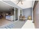 Covered patio area features a seating area with views of the interior and exterior at 4411 Nw 53Rd Ct, Ocala, FL 34482