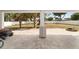 Wide backyard featuring a lawn mower, playground, and white vinyl fence at 4624 Se 32Nd Pl, Ocala, FL 34480