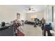 Bedroom with guitars, bed, and other instruments, illuminated by a ceiling fan with light fixture at 4624 Se 32Nd Pl, Ocala, FL 34480