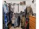 Walk-in closet with metal racks and shelves at 4624 Se 32Nd Pl, Ocala, FL 34480