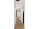 Hallway with carpet floors and arched doorways at 4624 Se 32Nd Pl, Ocala, FL 34480