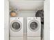 Laundry room featuring two large washers, dryer, and a hanging rack at 4624 Se 32Nd Pl, Ocala, FL 34480