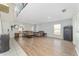 Bright living room with hardwood floors, arch windows, and neutral paint at 4624 Se 32Nd Pl, Ocala, FL 34480