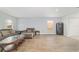 Spacious living room features laminate floors and a comfortable seating area for entertaining at 4624 Se 32Nd Pl, Ocala, FL 34480