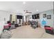 Spacious upstairs loft area featuring multiple windows for natural light at 4624 Se 32Nd Pl, Ocala, FL 34480