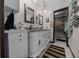 Bathroom featuring double sinks, granite counters and new stylish finishes at 4710 Se 30Th Ct, Ocala, FL 34480