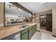 View of the kitchen and dining space with a breakfast bar, modern appliances and pantry at 4710 Se 30Th Ct, Ocala, FL 34480