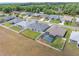 Aerial view of the neighborhood showcases homes with well-kept lawns at 4743 Nw 11Th Ct, Ocala, FL 34475