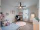 Cozy bedroom featuring a stylish desk area and soft, plush carpeting at 4743 Nw 11Th Ct, Ocala, FL 34475