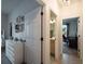 Bright hallway showcasing access to a bedroom, bathroom, and office space at 4743 Nw 11Th Ct, Ocala, FL 34475