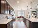 Modern kitchen with white counters, herringbone tile backsplash, and stainless steel appliances at 4743 Nw 11Th Ct, Ocala, FL 34475