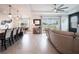 Open living space with a sleek kitchen, dining area, and comfortable seating arrangement at 4743 Nw 11Th Ct, Ocala, FL 34475