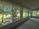 Bright sunroom filled with natural light and scenic views of the outdoor landscape at 606 Midway Dr # B, Ocala, FL 34472