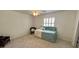 Bright bedroom with a twin bed and a ceiling fan at 6070 Sw 98Th Loop, Ocala, FL 34476