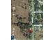 Close aerial view of the property location in the neighborhood, outlined in red for easy identification at 6306 Pecan Crse, Ocala, FL 34472