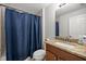 Bathroom with updated vanity and shower at 6306 Pecan Crse, Ocala, FL 34472