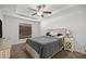 Comfortable bedroom with a plush bed, a large window, and neutral decor at 6306 Pecan Crse, Ocala, FL 34472